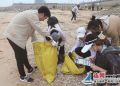 全国首个“绿色生活日”  清洁海岸义工团志愿者争做“美丽中国行动者”